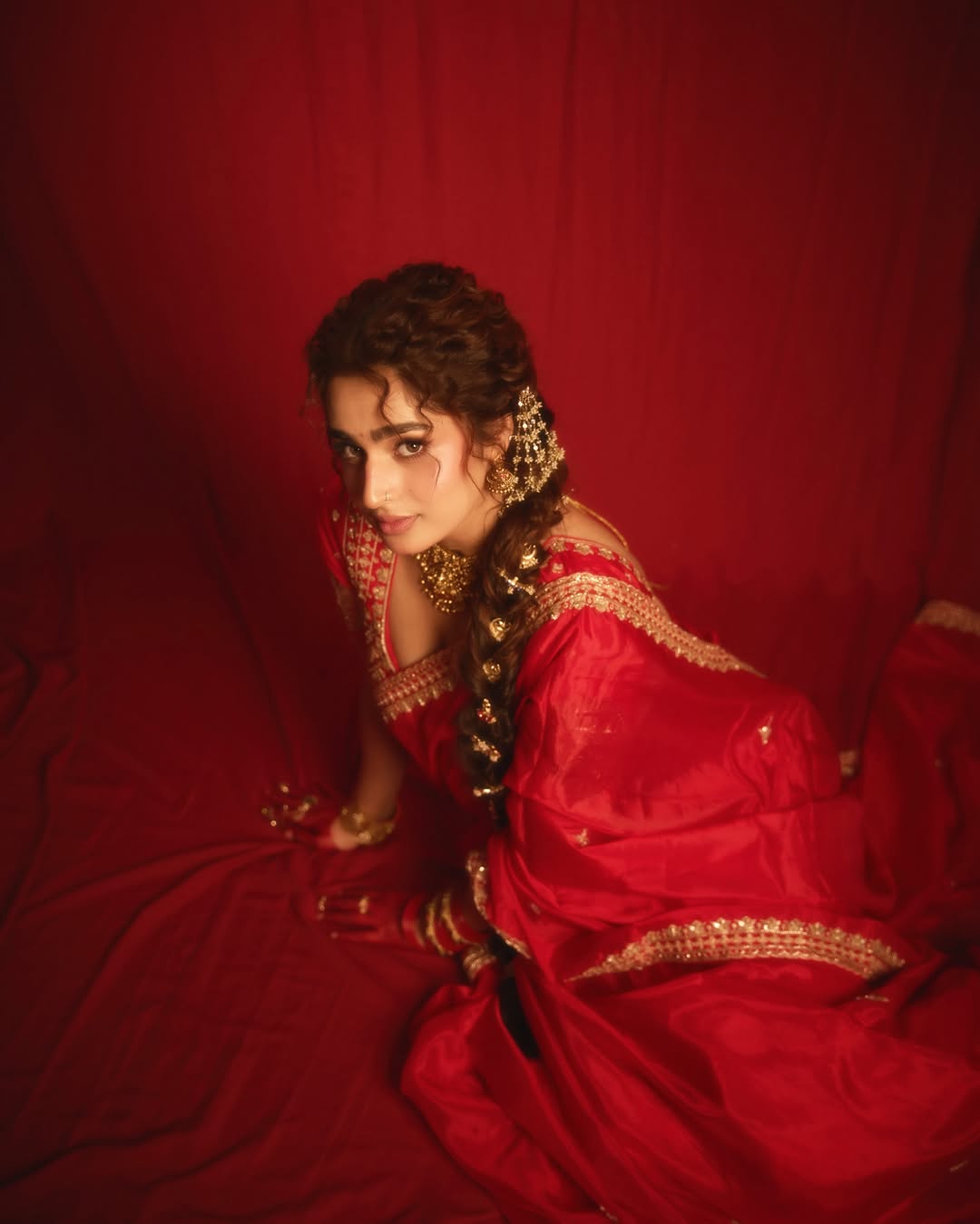Ayesha Khan’s Classic Red Saree Look Captures Attention