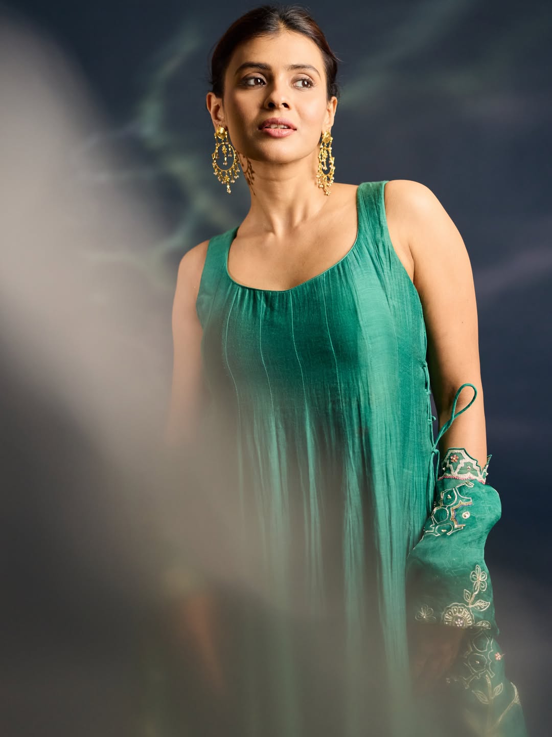 Hebah Patel Looks Elegant in a Flowing Teal Dress