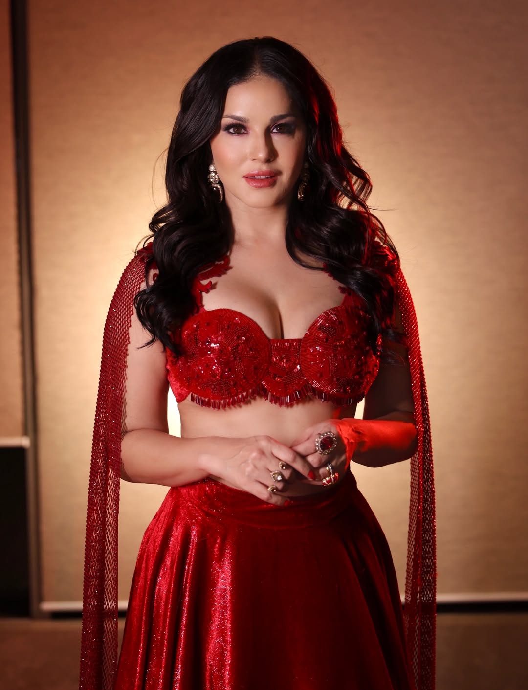 Sunny Leone Flaunts Festive Glamour in a Sequined Bustier and Velvet Skirt