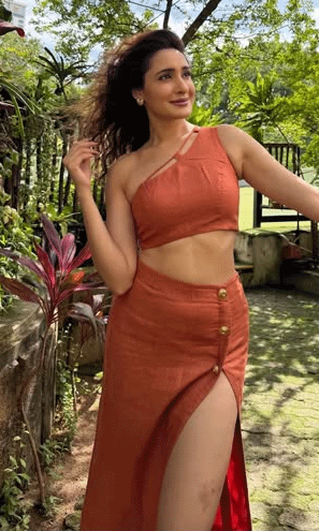 Pragya Jaiswal Stuns in a Rust-Orange Crop Top During Colombo Getaway