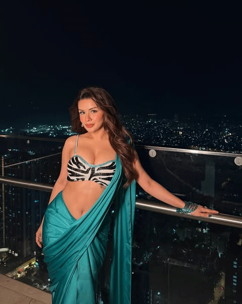 Avneet Kaur Stuns in Teal Satin Saree With a Bold Zebra-Print Blouse
