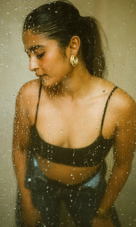 Chaithra J Achar Stuns in a Black Crop Top for an Artistic Photoshoot