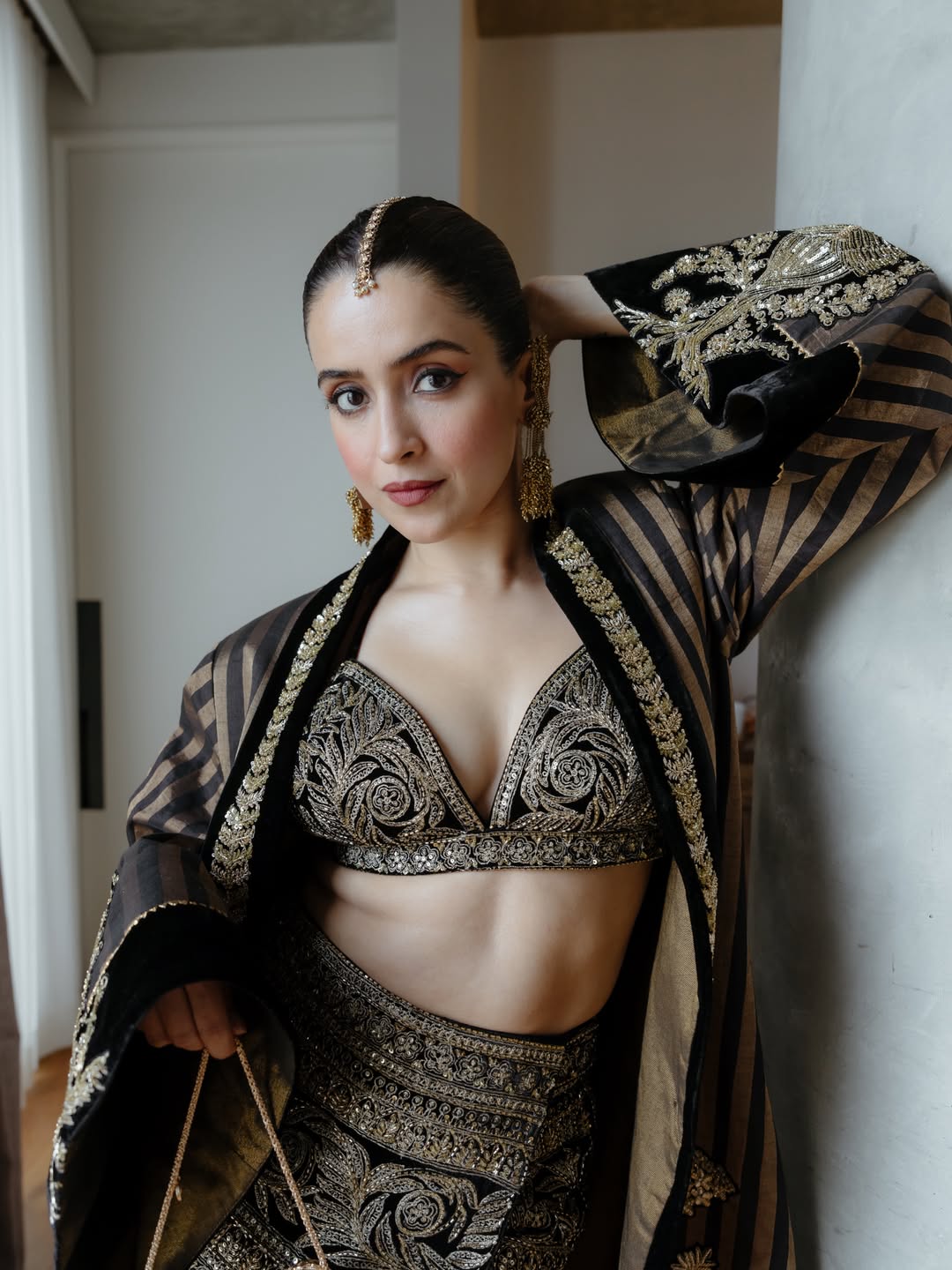 Sanya Malhotras Royal Black and Gold Look Radiates Festive Elegance