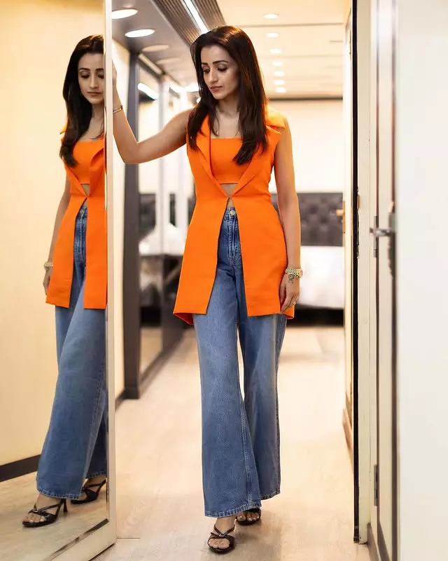 Trisha Krishnan Slays in Chic Orange and Denim Look