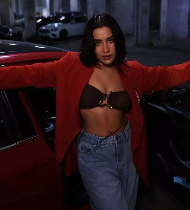 Sara Gurpal Turns Up the Style in Red Jacket