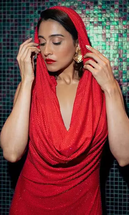 Regina Cassandra Striking a Moment in Red