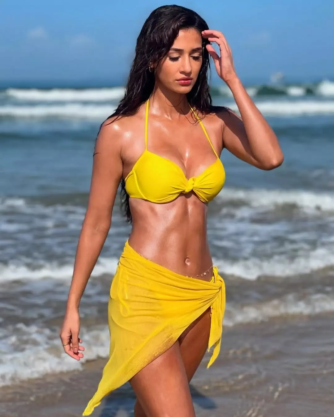 Disha Patani Turns Up the Heat in a Bold Yellow Beach Look