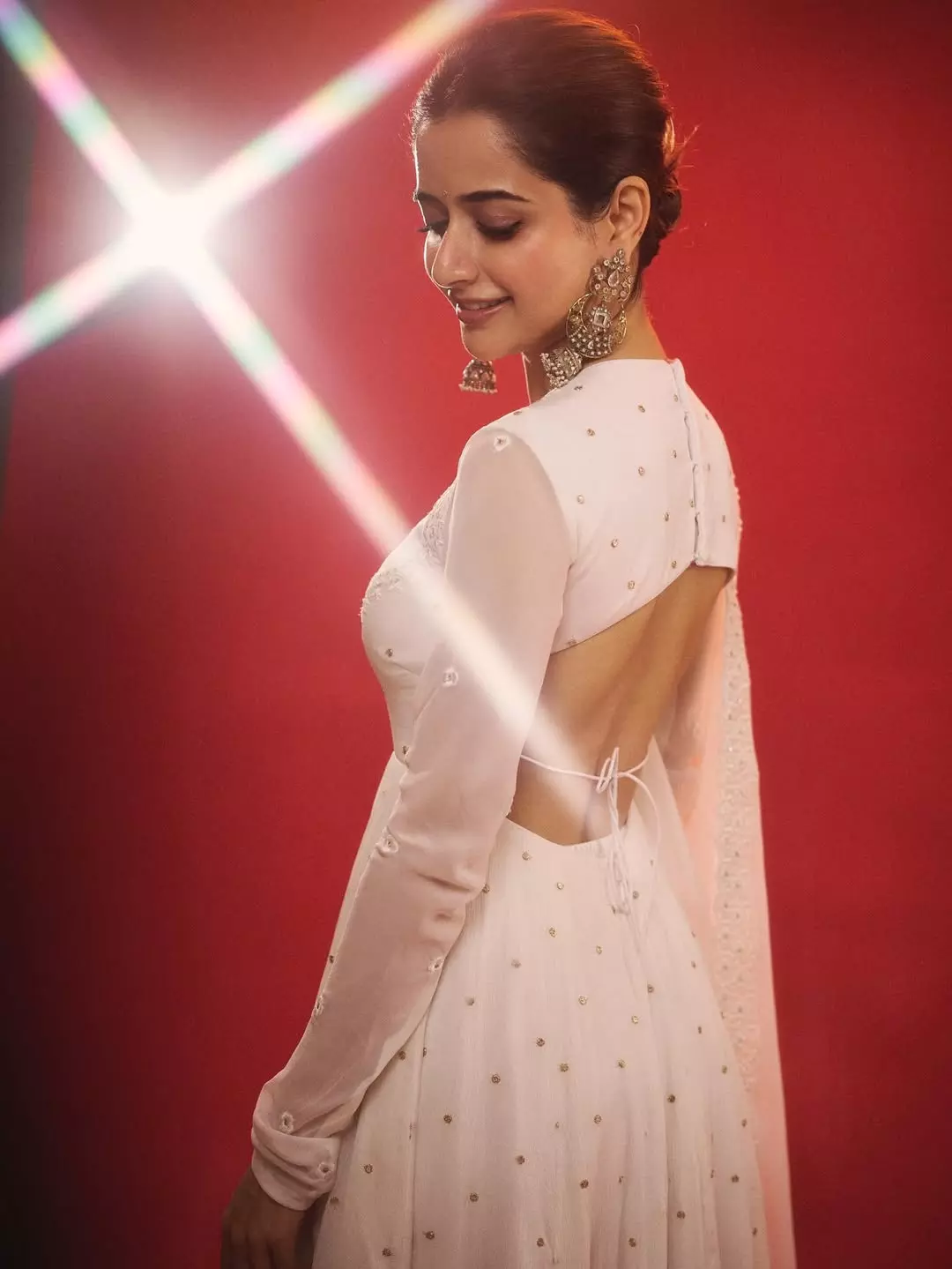 Ashika Shines In A Regal White Attire