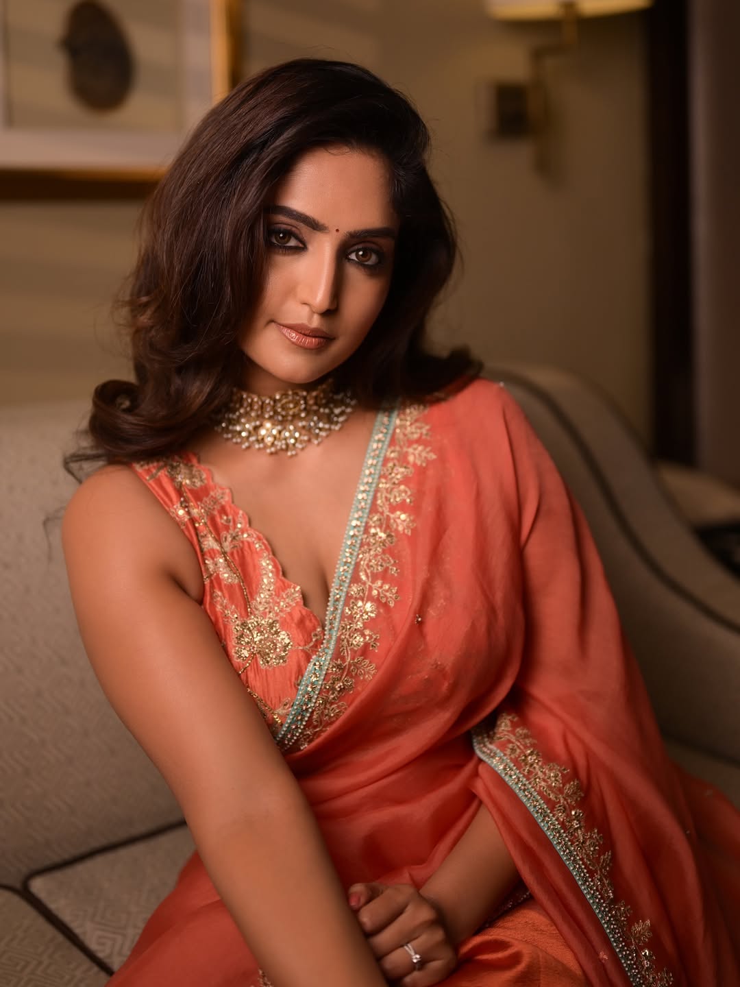 Reba Monica John Dazzles in Orange Saree