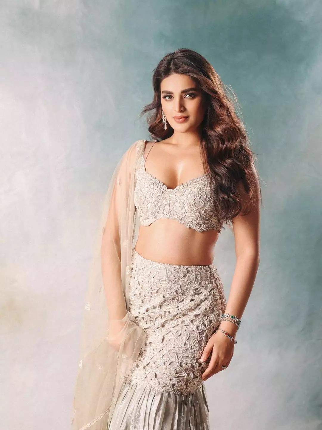 Nidhhi Agerwal Poses in Elegant Embroidered Lehenga