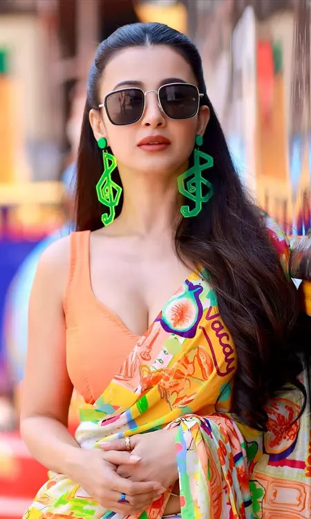Monami Ghosh Radiates In Orange Saree