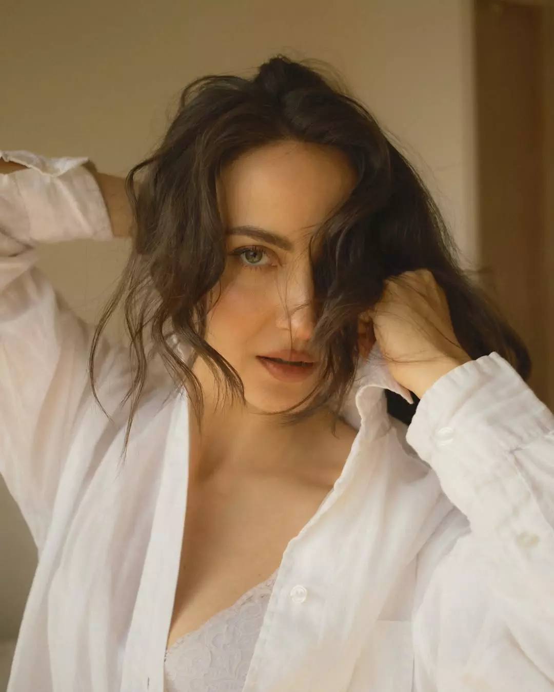 Elli AvrRams Sultry Bedroom Glow: Light at the Tunnels End