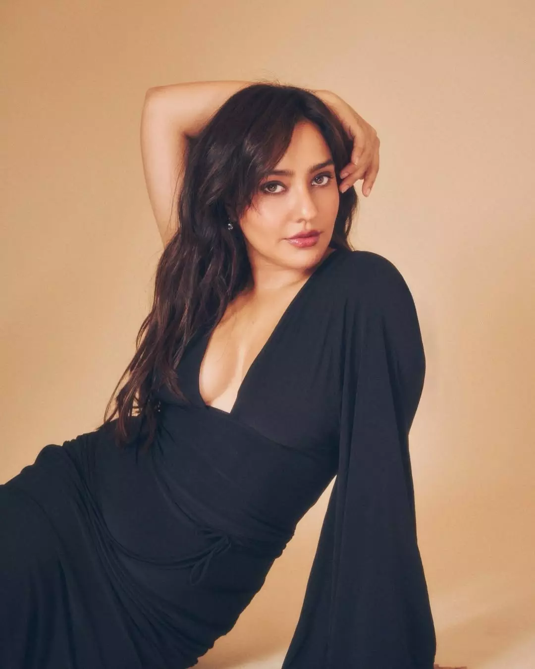Neha Sharma’s Black Magic: A Vision of Pure Elegance