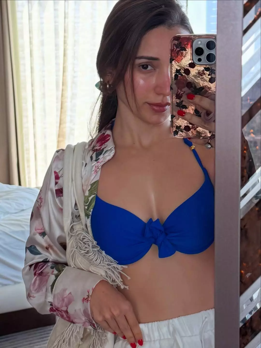 Heli Daruwala Glows in Blue Bikini Mirror Selfie