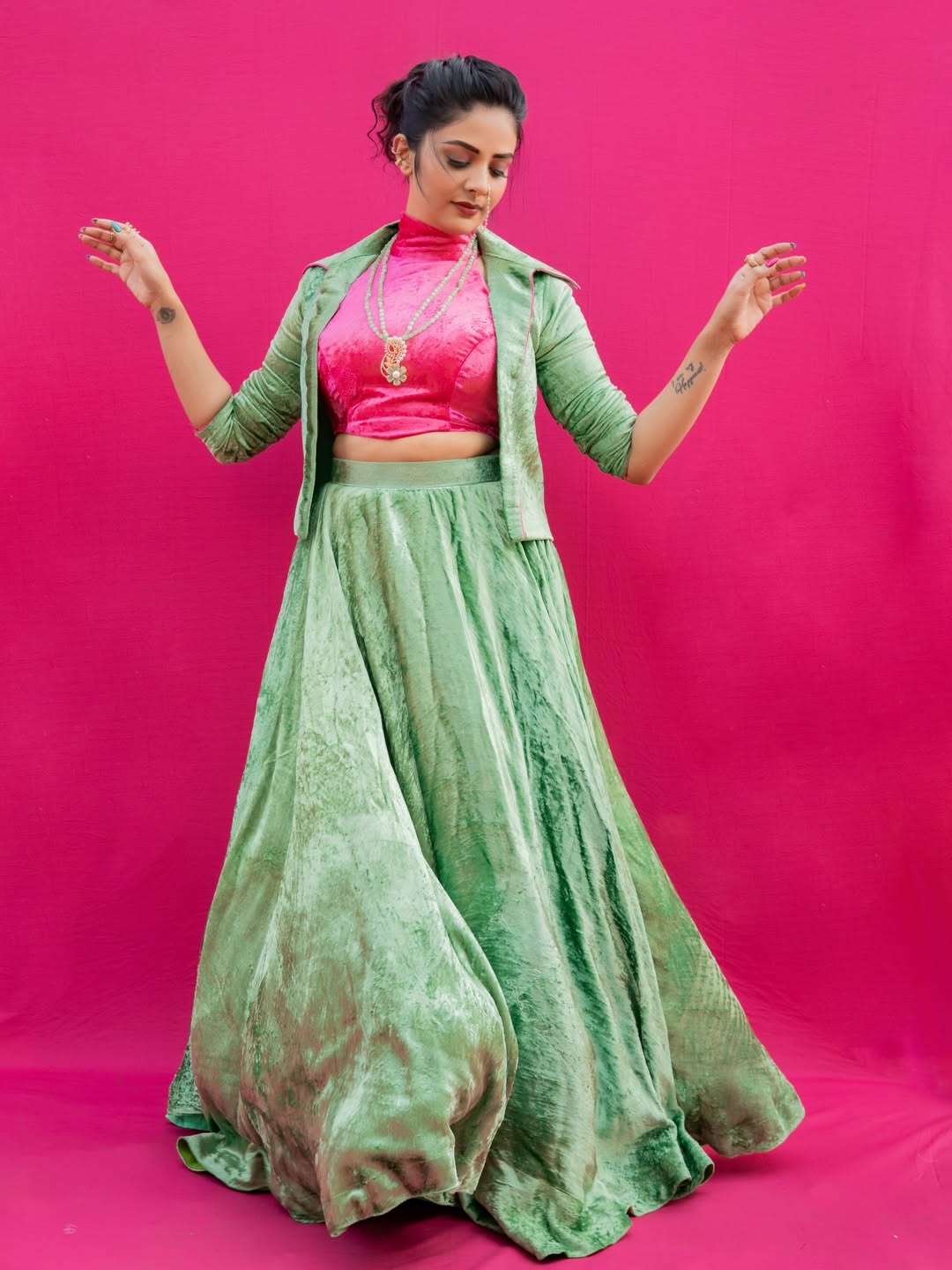 Sreemukhi stuns in pink velvet blouse and sage green lehenga
