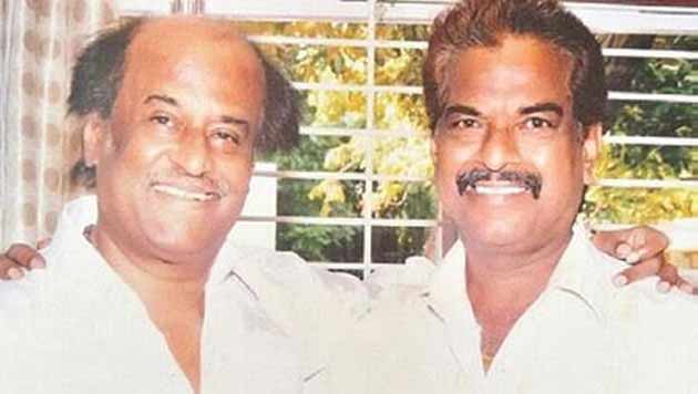 For whos Phone Call does Rajini wait?