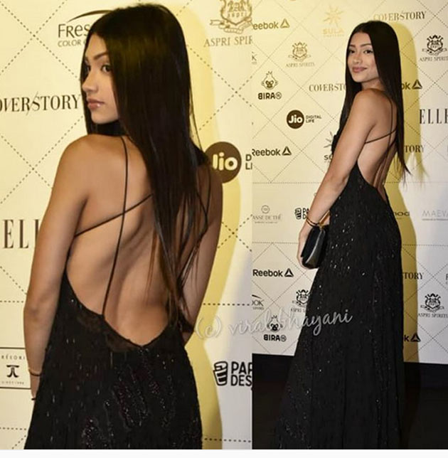 Photo Story: Backless Teenage Beauty