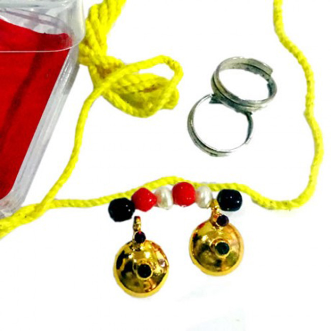 బాలికలకు తాళిబొట్లు.. వైసీపీ నాయకుడి నిర్వాకం