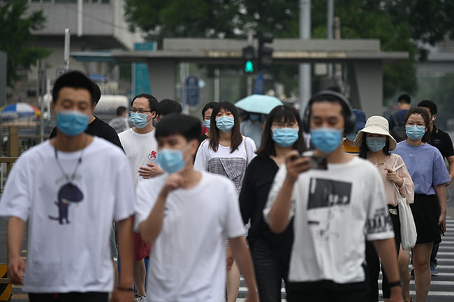 Beijing Eases Restrictions On Wearing Face Mask At Public Places