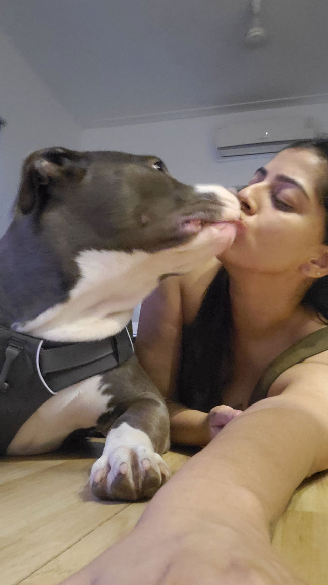 Pic Talk: Varalakshmis Endearing Kiss To Her Dog!