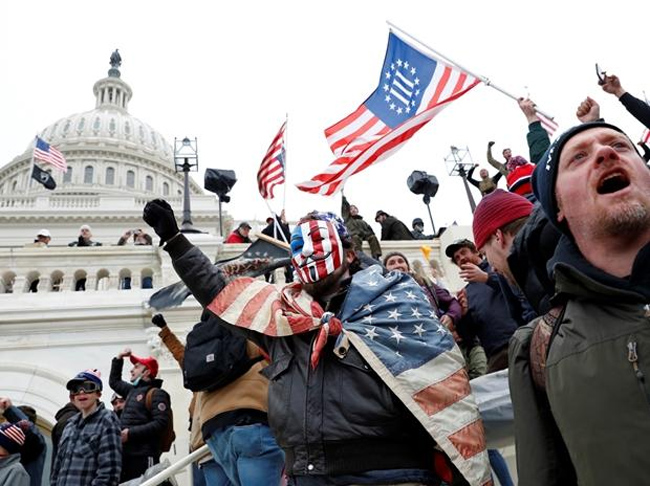 కేపిటల్ హౌస్ పై దాడి... ఇద్దరు సస్పెండ్ , ఒకరు అరెస్ట్ !