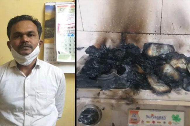 గ్యాస్ పొయ్యి వెలిగించి రూ.20లక్షల నోట్లను కాల్చేశాడు