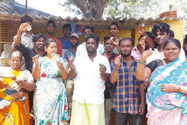 Voters protest against candidate for distributing Rold Gold!