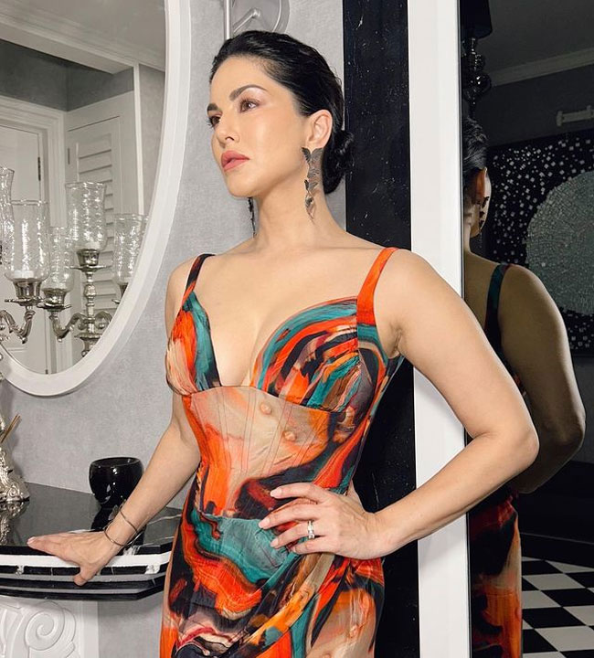 sunny leone orange dress Sunny Leone Paints The Town Orange in Sexy Orange Off-Shoulder Gown -PICS