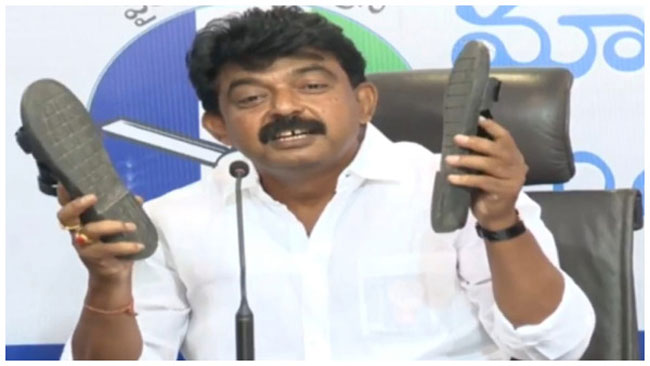 Perni Nani Warns Pawan By Flashing Chappals!